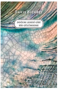 Doğum Lekesi Gibi Bir Gülümseme